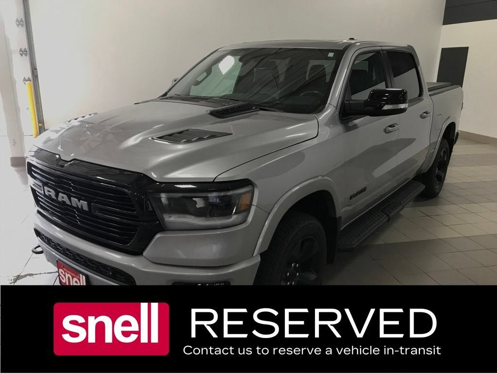 2021 RAM 1500 Laramie in Gray — front three-quarter view