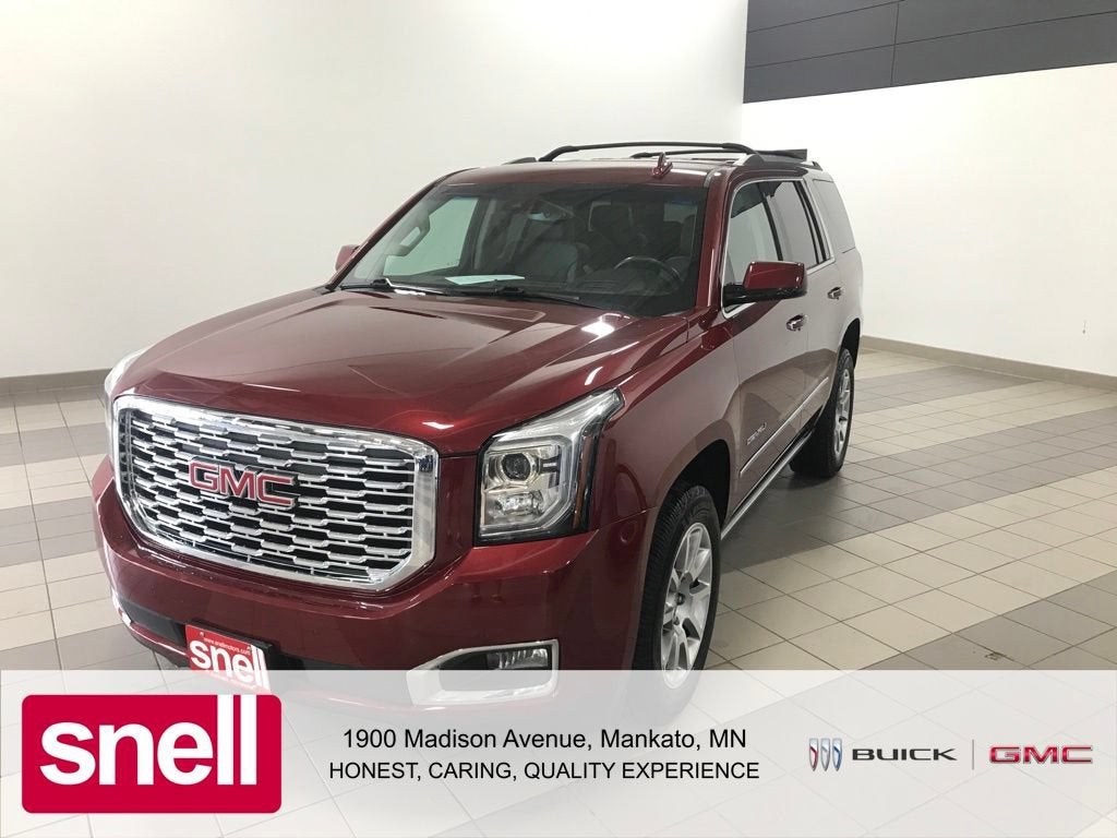 2019 GMC Yukon Denali in Crimson Red Tintcoat — front three-quarter view