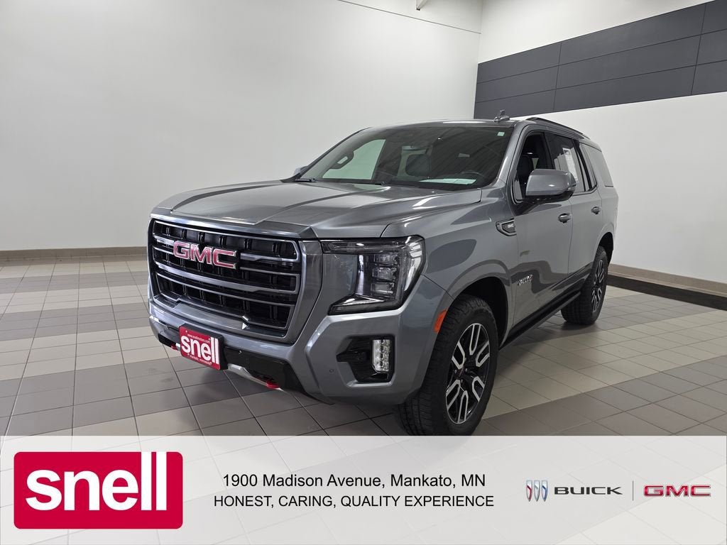 2022 GMC Yukon AT4 in Satin Steel Metallic — front three-quarter view