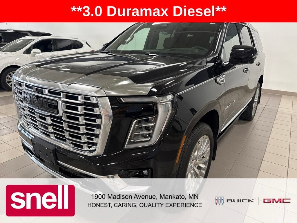 2025 GMC Yukon Denali in Onyx Black — front three-quarter view