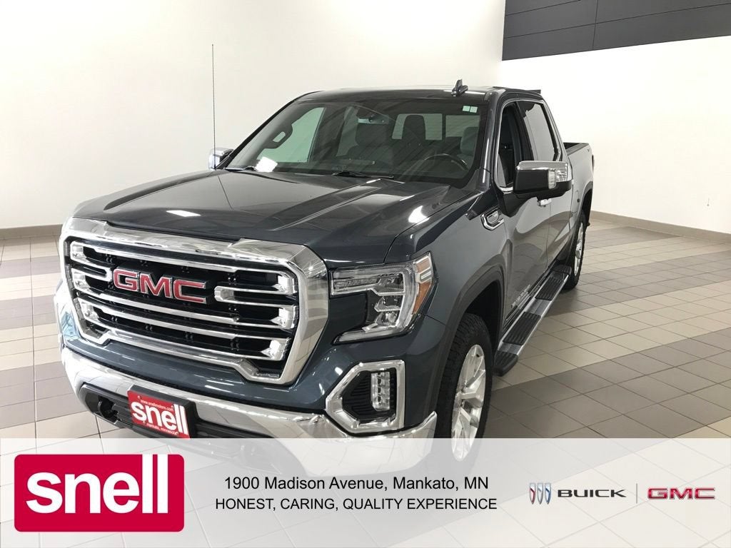 2021 GMC Sierra 1500 SLT in Dark Sky Metallic — front three-quarter view