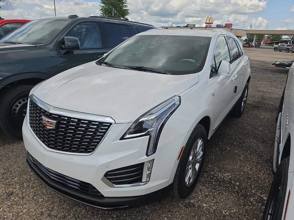2026 Cadillac XT5 Luxury in Crystal White Tricoat — front three-quarter view