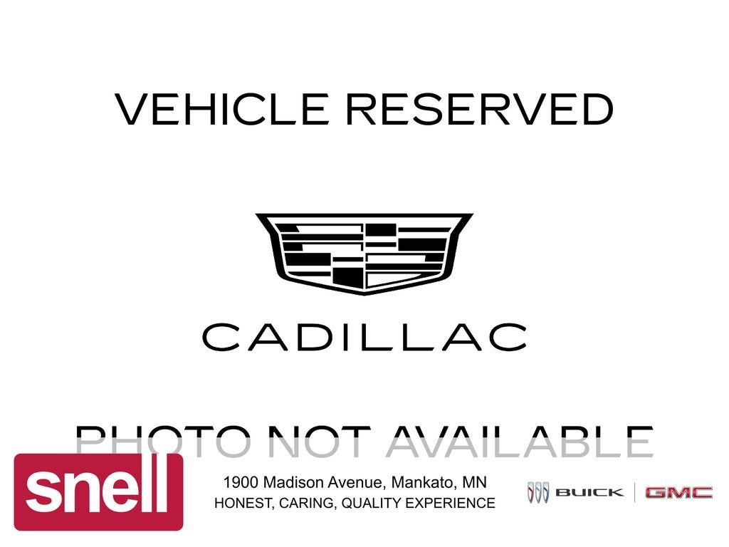 2026 Cadillac XT5 Premium Luxury in Emerald Lake Metallic — front three-quarter view