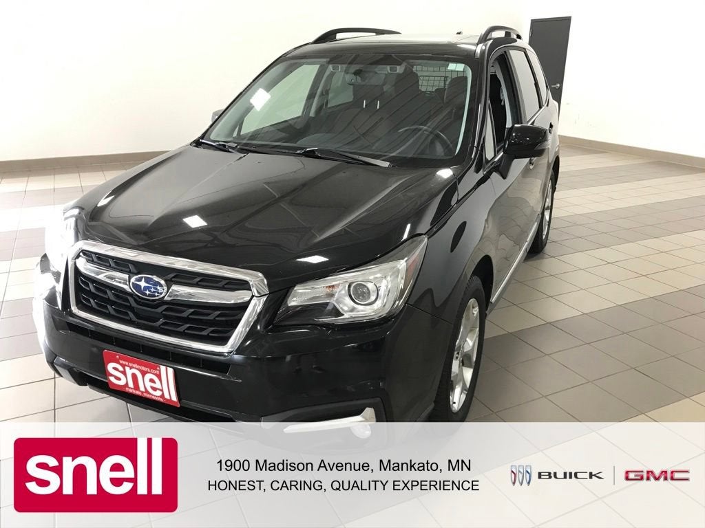 2018 Subaru Forester Touring in Black — front three-quarter view